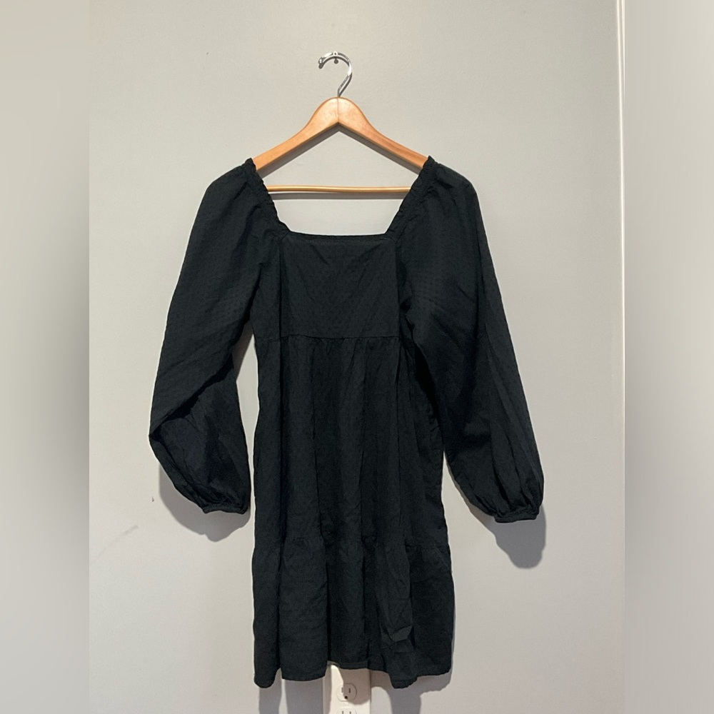 Black dress; short, off shoulders, cottage core.
